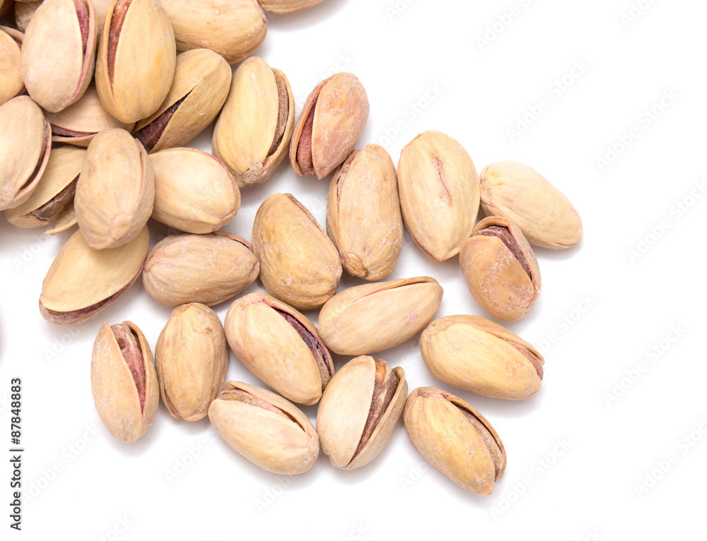 pistachios on a white background. close pistachios on a white background. close