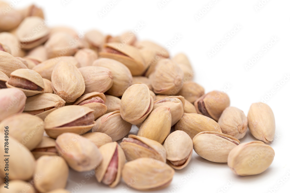 pistachios on a white background. close pistachios on a white background. close