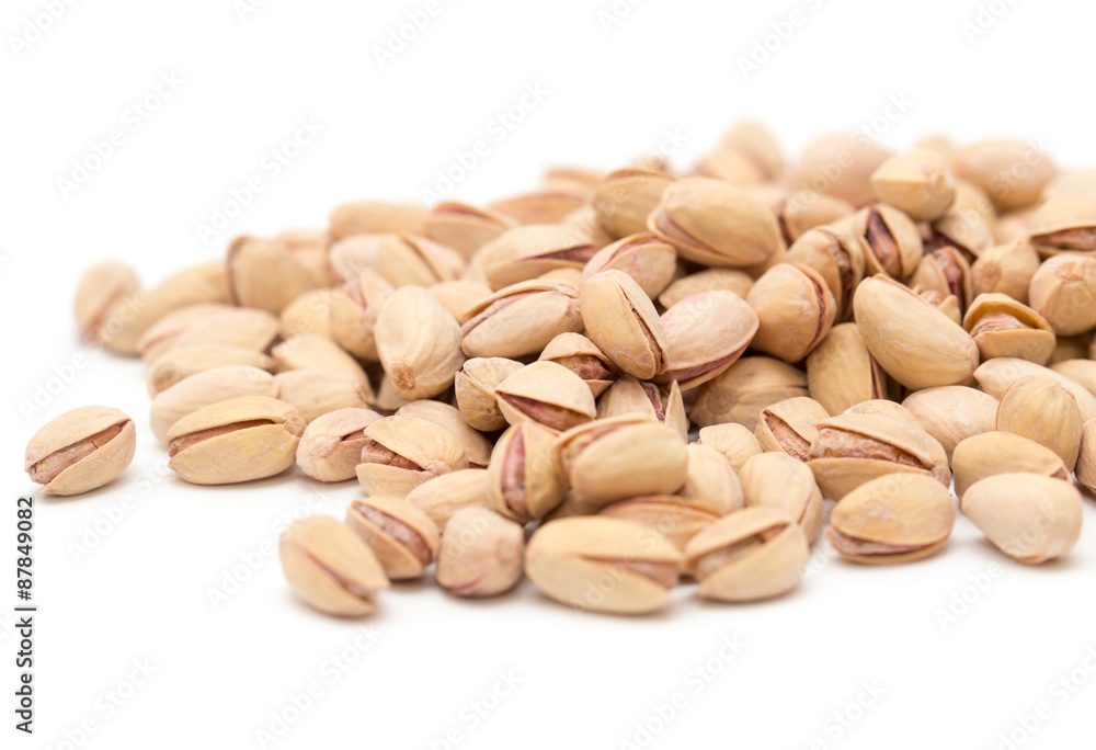 pistachios on a white background. close pistachios on a white background. close