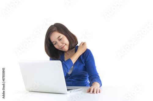 Business woman do stretch with laptop in front © tanawatpontchour