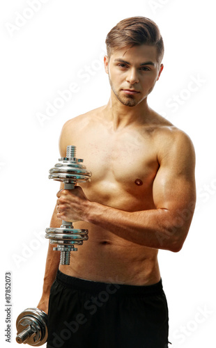 Muscle young man holding du...