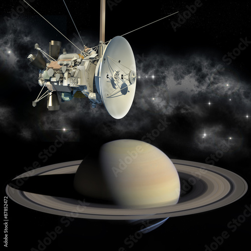 Fototapeta Naklejka Na Ścianę i Meble -  Unmanned spacecraft similar with the Cassini Huygens orbiter, passing Saturn.