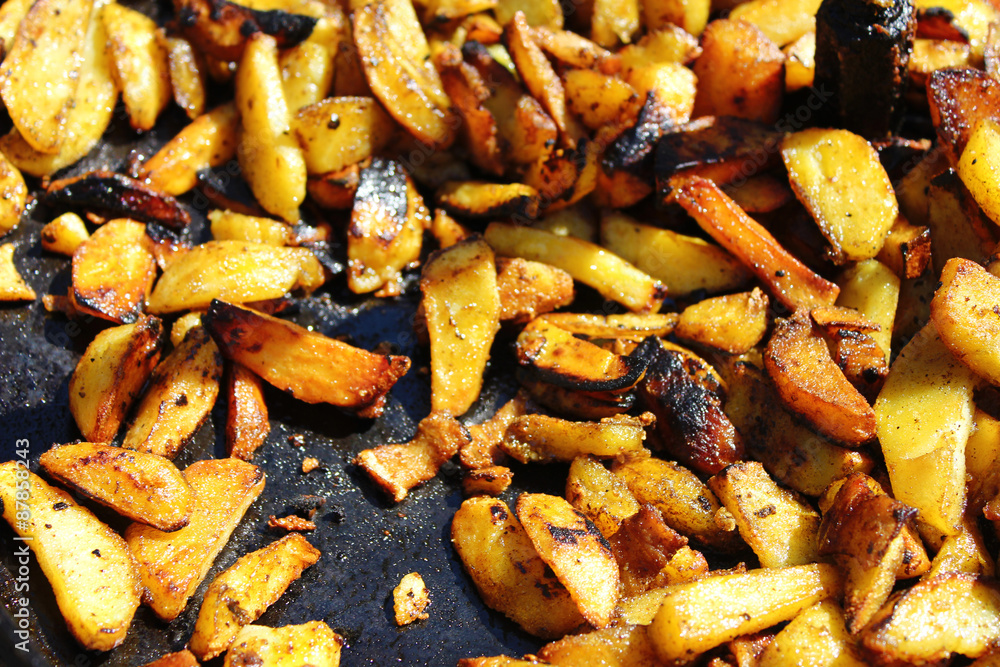 Frying pan with fried potatoes closeup Frying pan with fried potatoes closeup
