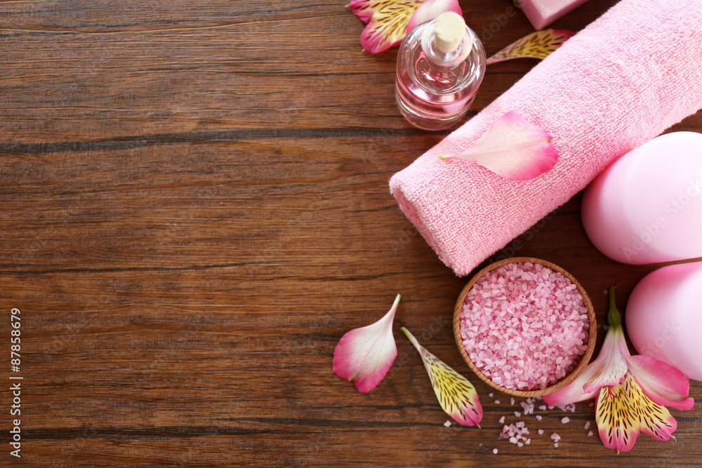 Beautiful composition of spa treatment on wooden table Beautiful composition of spa treatment on wooden table
