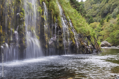 Landscape of mossy rocks and waterfall/Waterfall in Mossbrae Springs, Dunsmuir, California