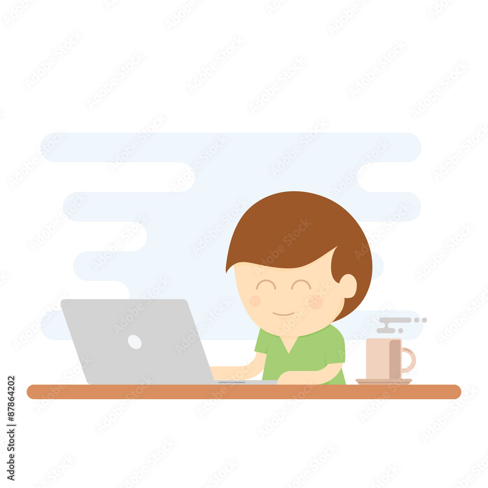 Boy smiling while using laptop for working