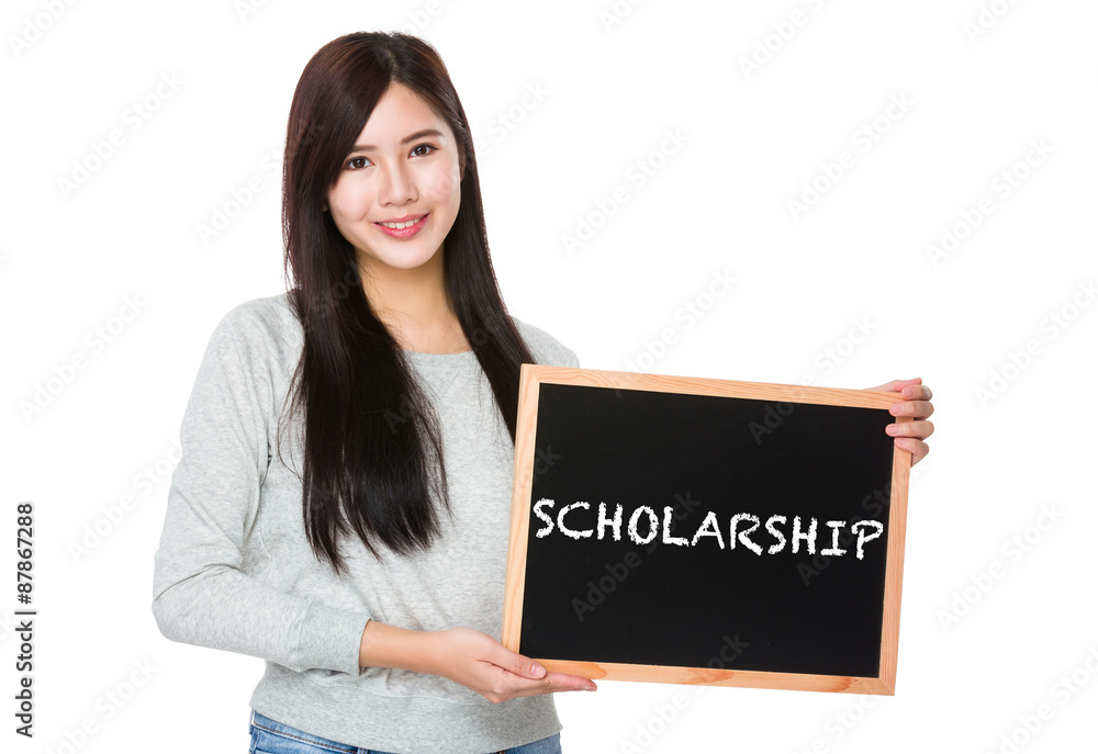 Young woman hold with chalkboard showing a word scholarship Young woman hold with chalkboard showing a word scholarship