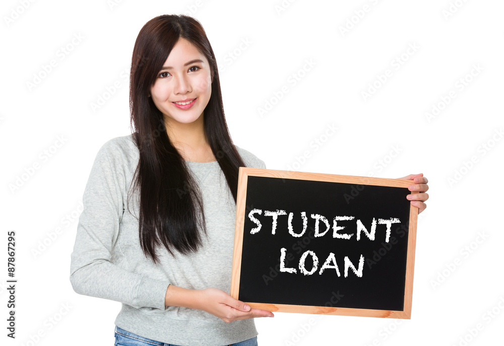Young woman hold with chalkboard showing phrase student loan Young woman hold with chalkboard showing phrase student loan
