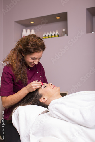 Young women having a cosmetic treatment