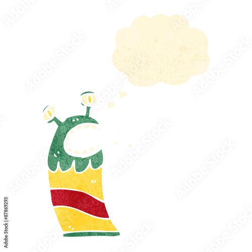 cartoon little alien with thought bubble