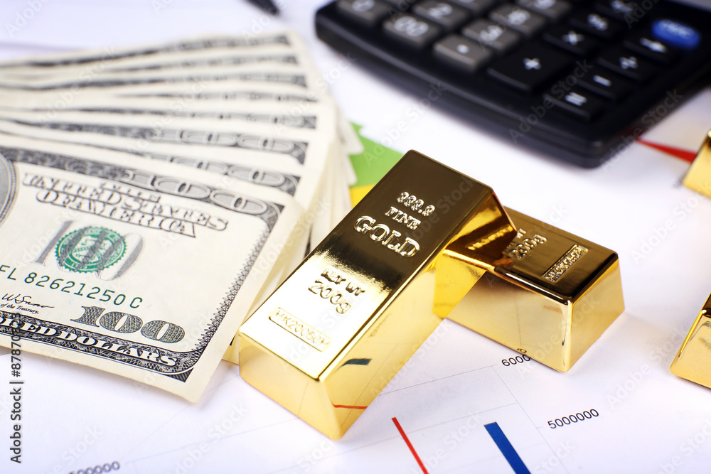 Gold bullion with money on table close up Gold bullion with money on table close up