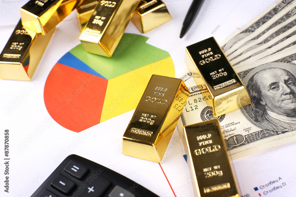 Gold bullion with money on table close up Gold bullion with money on table close up