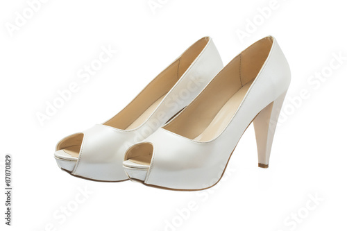 Ivory female wedding shoes isolated over white background