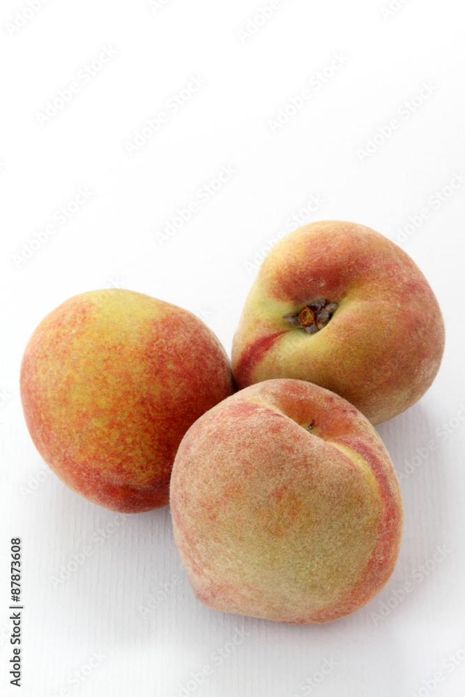 Three Ripe peaches fruit isolated on white background, cutout Three Ripe peaches fruit isolated on white background, cutout