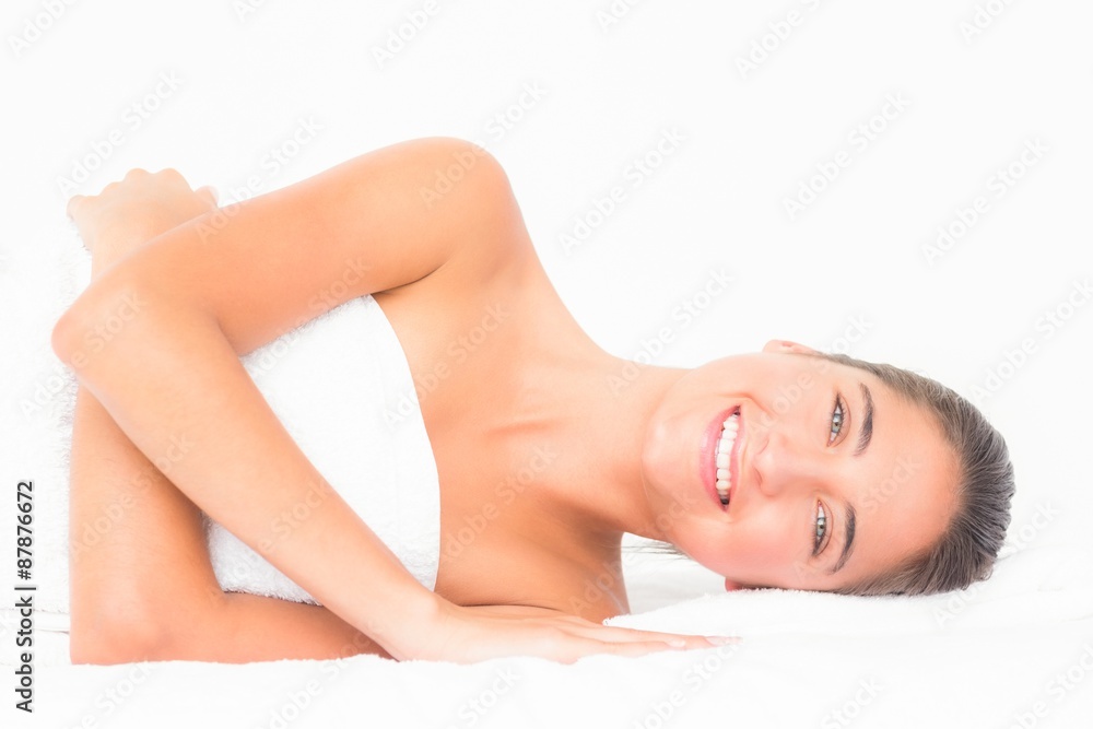 Close up of a beautiful young woman on massage table