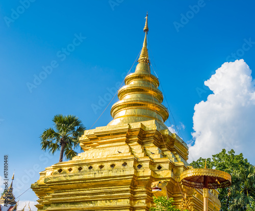 old temple with white cloud and blue sky photo