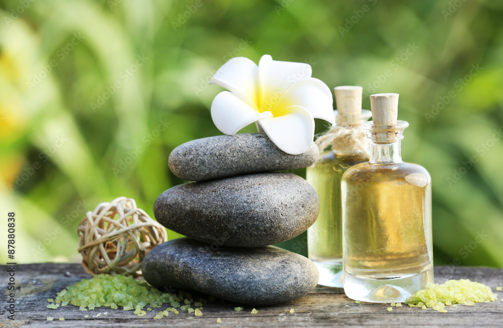 Spa still life on wooden table on river Spa still life on wooden table on river