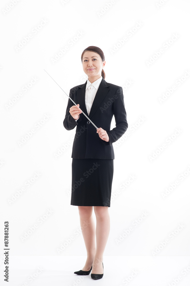 指し棒を持っているスーツの女性 立ちポーズ Stock Photo Adobe Stock