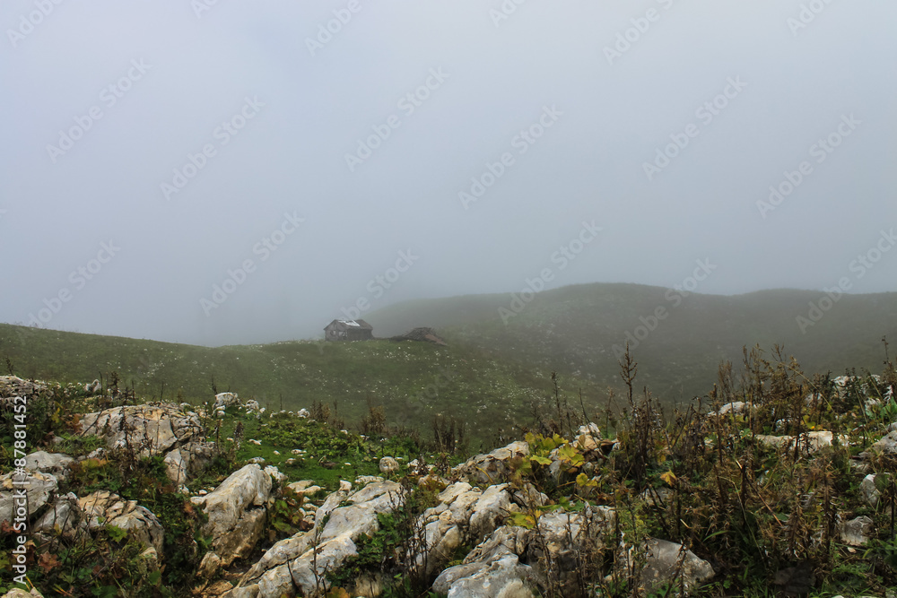 shepherd hut on mountains with rocks shepherd hut on mountains with rocks