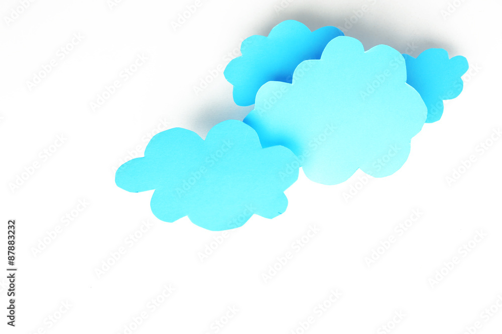 Blue paper clouds, isolated on white. Cloud computing concept. Blue paper clouds, isolated on white. Cloud computing concept.