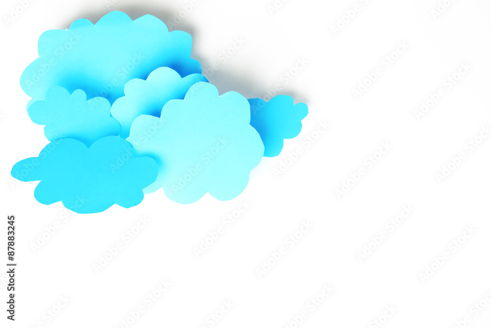 Blue paper clouds, isolated on white. Cloud computing concept. Blue paper clouds, isolated on white. Cloud computing concept.