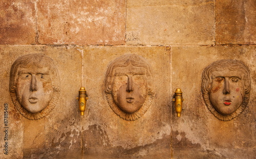 Quadro em tela Ancient bas-relief on the wall in the historic city of Barcelona