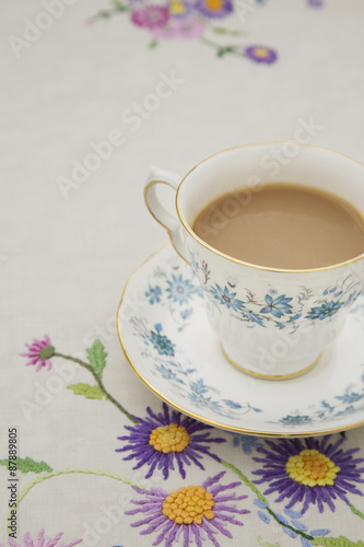 Vintage tea cup,saucer and tablecloth