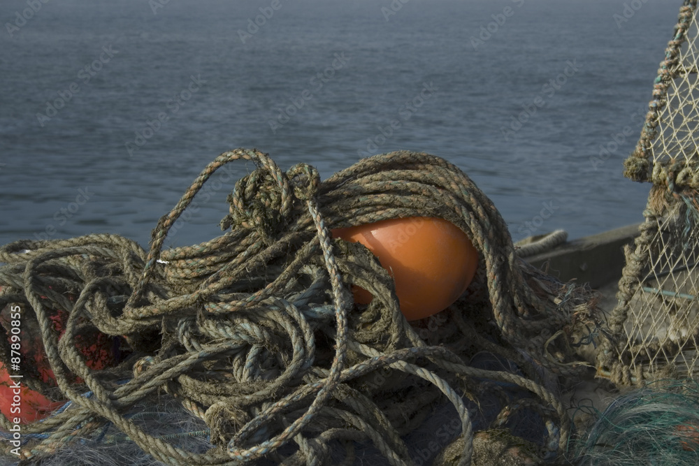 sea fishing buoys and rope on quay sea fishing buoys and rope on quay