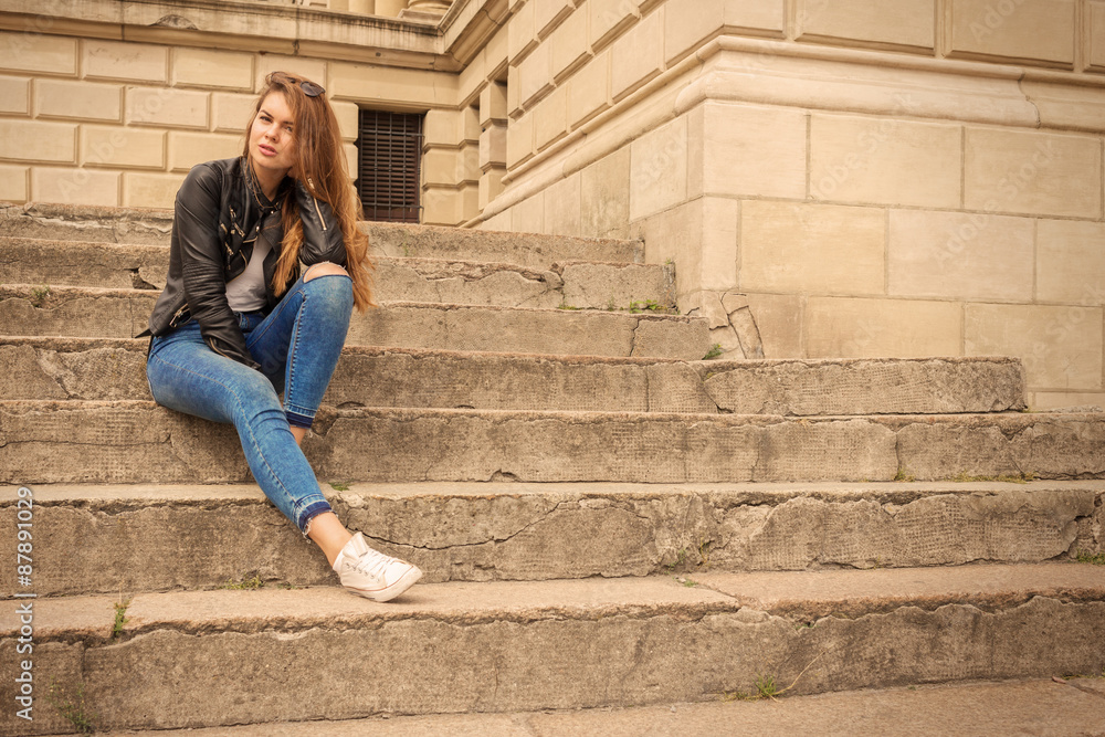woman sitting on steps woman sitting on steps
