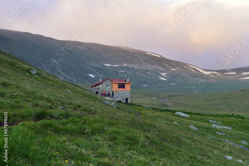 High Mountain hut in dusk