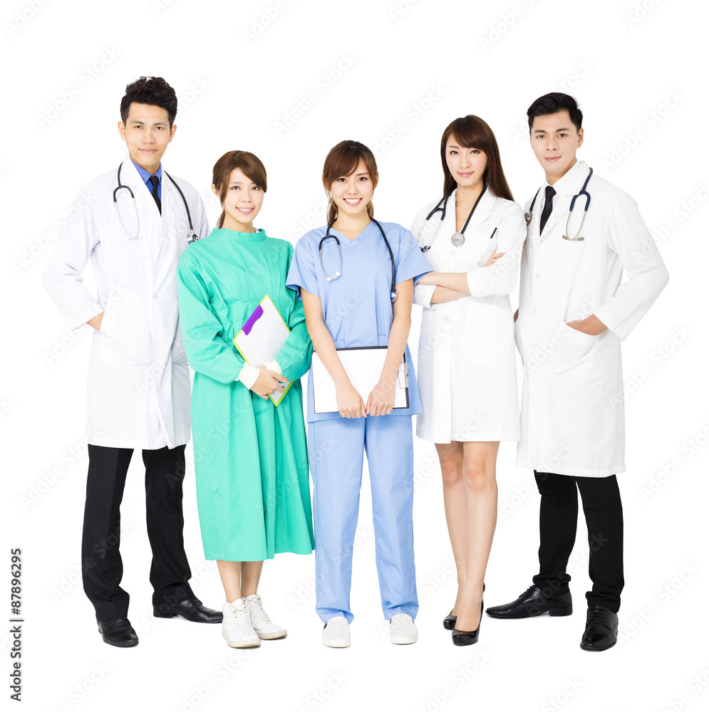 smiling Medical team standing together isolated on white smiling Medical team standing together isolated on white