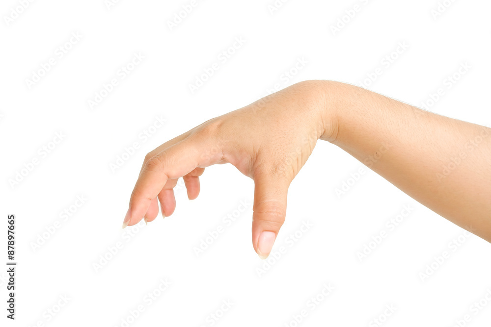 Well shaped Female hand reaching for something isolated on a white background Well shaped Female hand reaching for something isolated on a white background