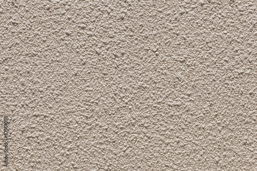 The pattern rugged cement wall background.