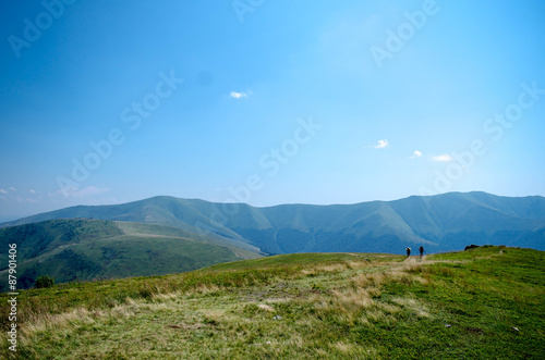 Carpathian mountains summer landscape with green sunny hills