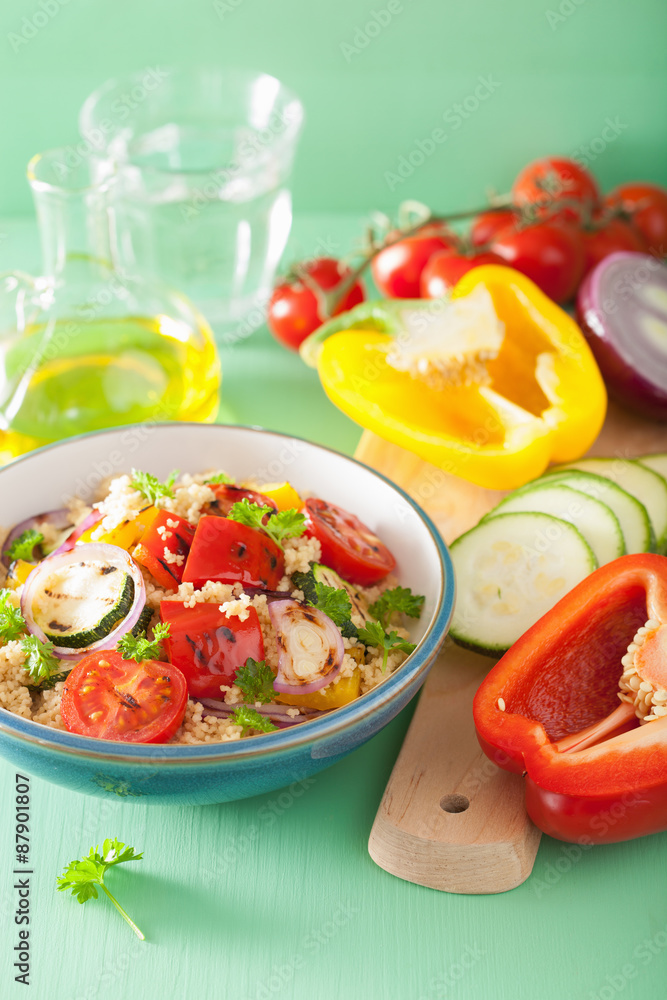 healthy couscous salad with tomato pepper zucchini onion