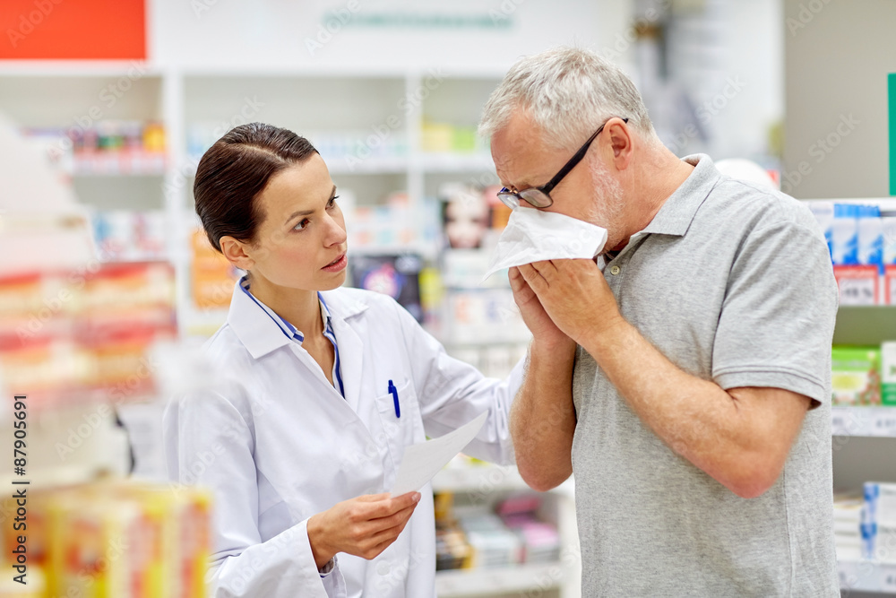 pharmacist and senior man with flu at pharmacy pharmacist and senior man with flu at pharmacy