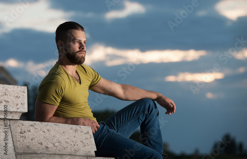 Man looking at sunset