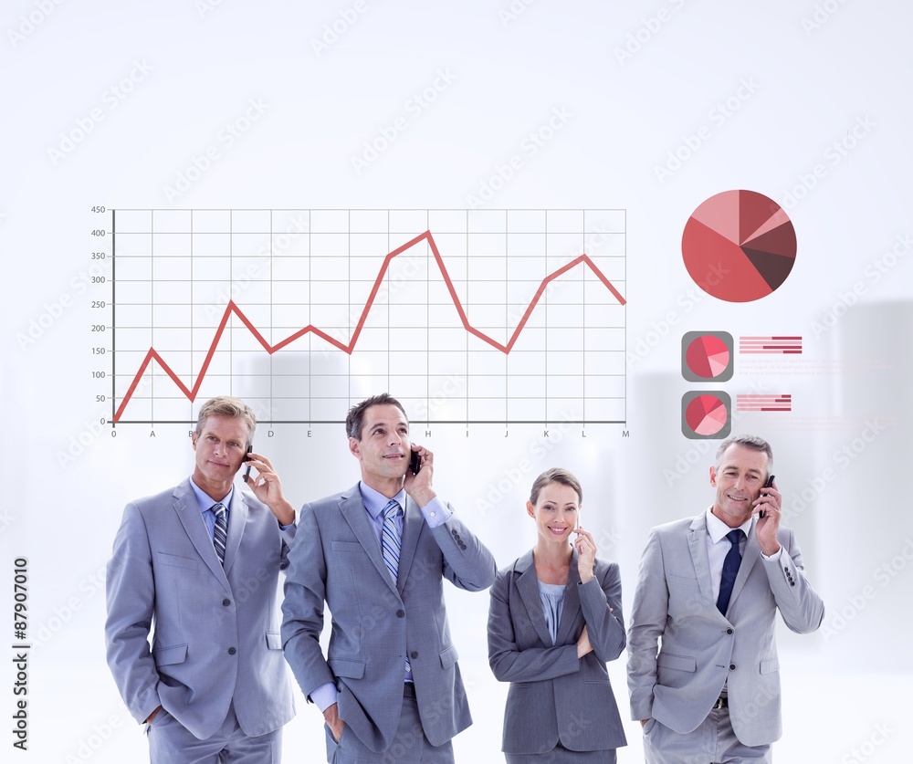 Composite image of employees using their mobile phone