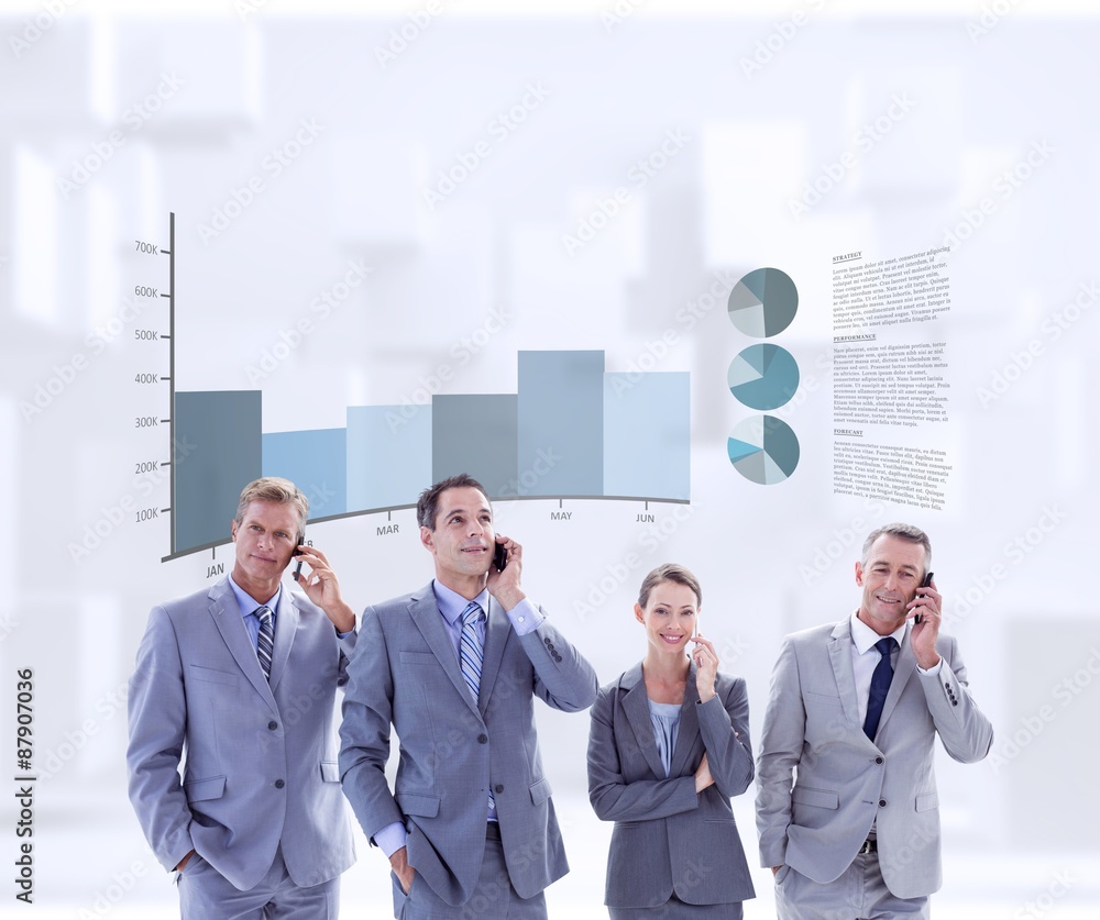 Fototapeta premium Composite image of employees using their mobile phone