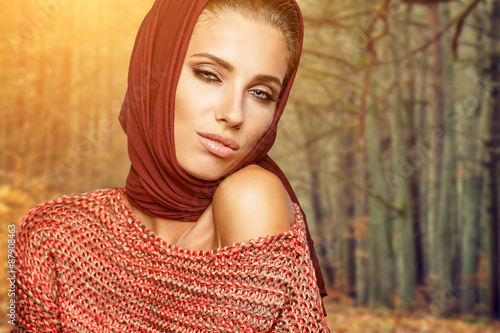 Fashion woman in autumn forest