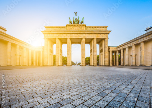 Brandenburger Tor (Brandenburg Gate) in golden morning light at sunrise, Berlin, Germany