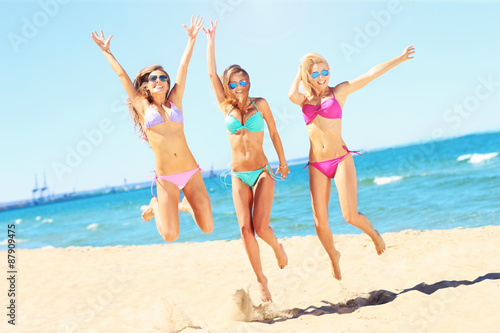 Group of women having fun on the beach