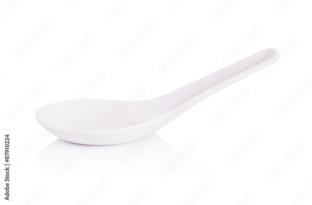 White empty ceramic spoon for soup on white background White empty ceramic spoon for soup on white background