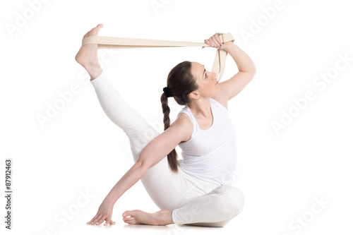 Yoga with props, parivritta kraunchasana pose photo