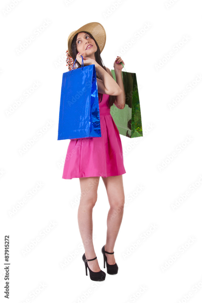 girl with pink dress and bags