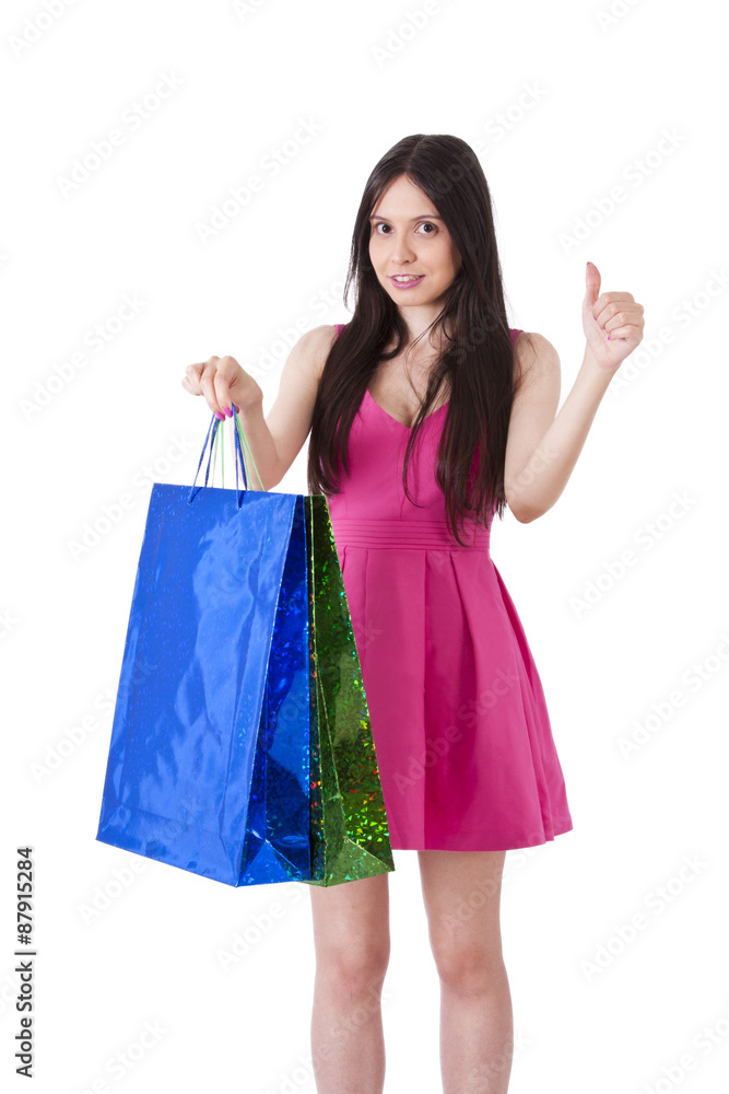 girl with pink dress and bags with sign ok