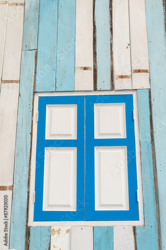 Colorful aged wooden window frame photo