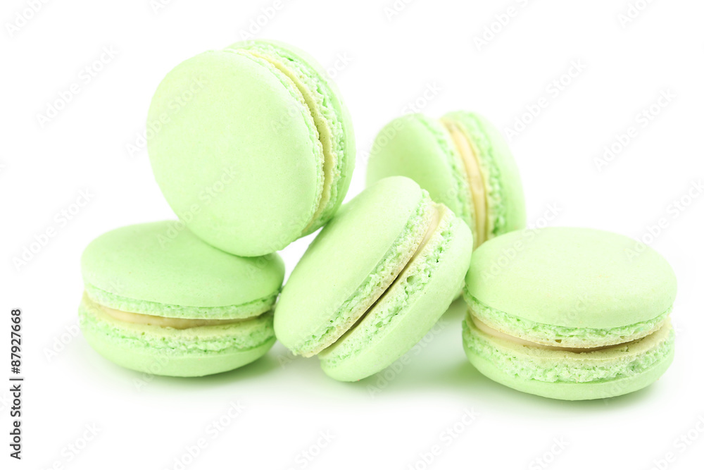 Tasty green macarons isolated on white Tasty green macarons isolated on white