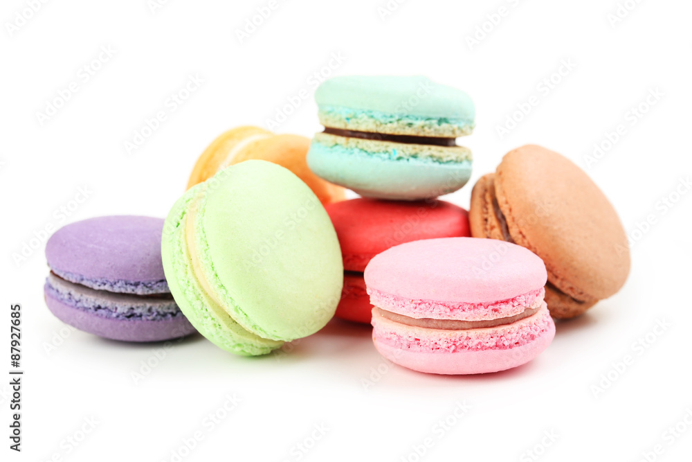 French colorful macarons isolated on white