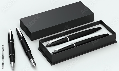 Writing set. Ball pen and ink pen in a box on a bright backgroun